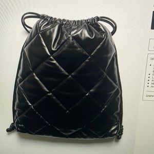 Stand Studio Ripley bag diamond quilted drawstring backpack
